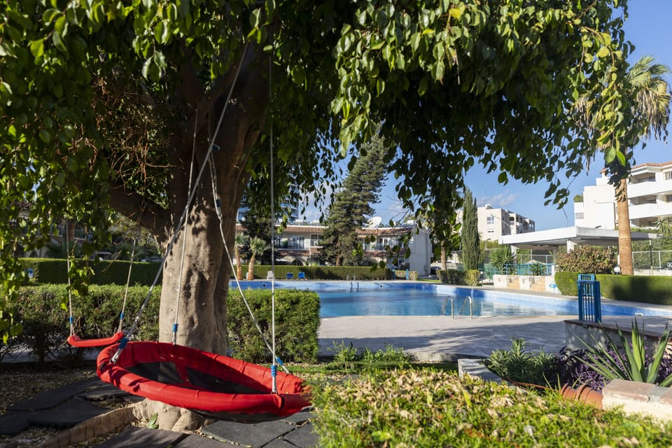 Outdoor pool, pool umbrellas, sun loungers