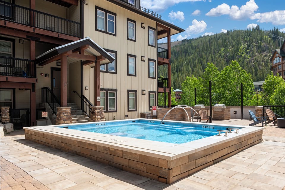 Fraser Crossing amenity deck - Fraser Crossing amenity deck with OVERSIZED hot tub, fire place and BBQ's for all guests to enjoy
