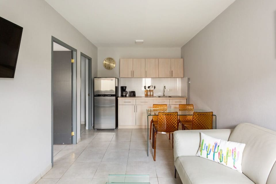 Our living room has air conditioning, a smart TV, and a room directory.