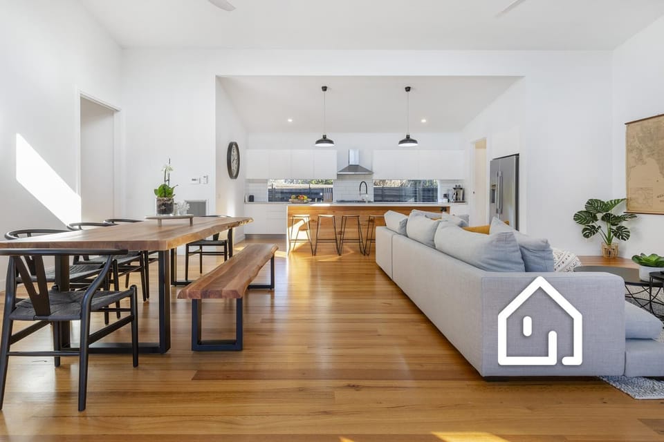 Second separate spacious living area, with comfortable couches and smart TV