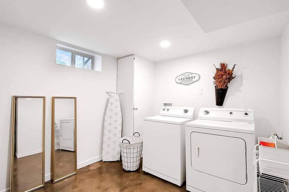 Laundry area with small workout space