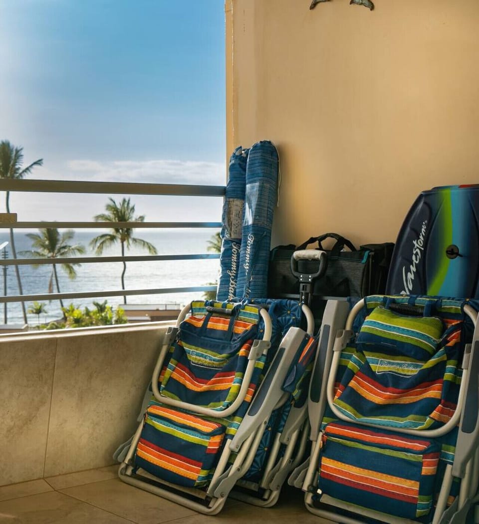 6 beach chairs, 2 beach umbrellas, 2 boogie boards, a cooler and and a beach cart provided.