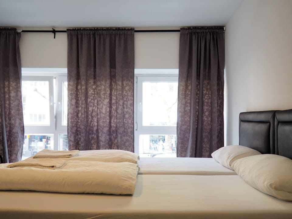 Comfort Double or Twin Room, Shared Bathroom | Desk, iron/ironing board, free WiFi, bed sheets