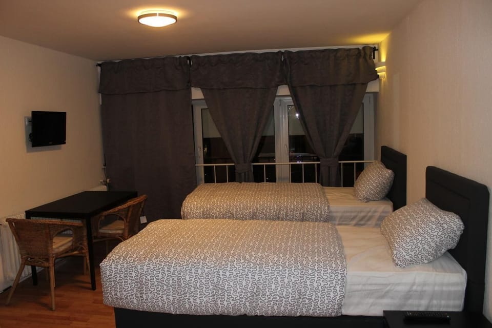 Desk, iron/ironing board, free WiFi, bed sheets