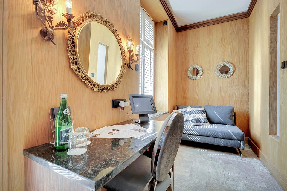 Double Room | Minibar, in-room safe, desk, iron/ironing board