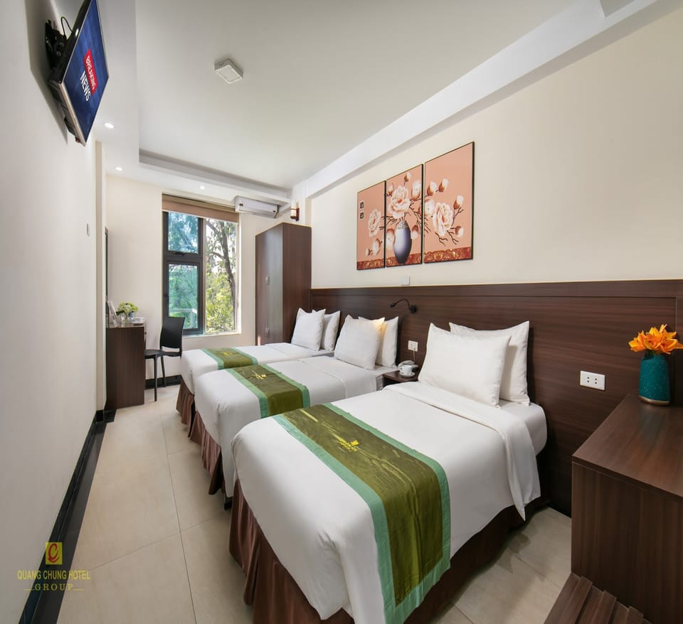 Triple Room | Minibar, desk, blackout drapes, soundproofing
