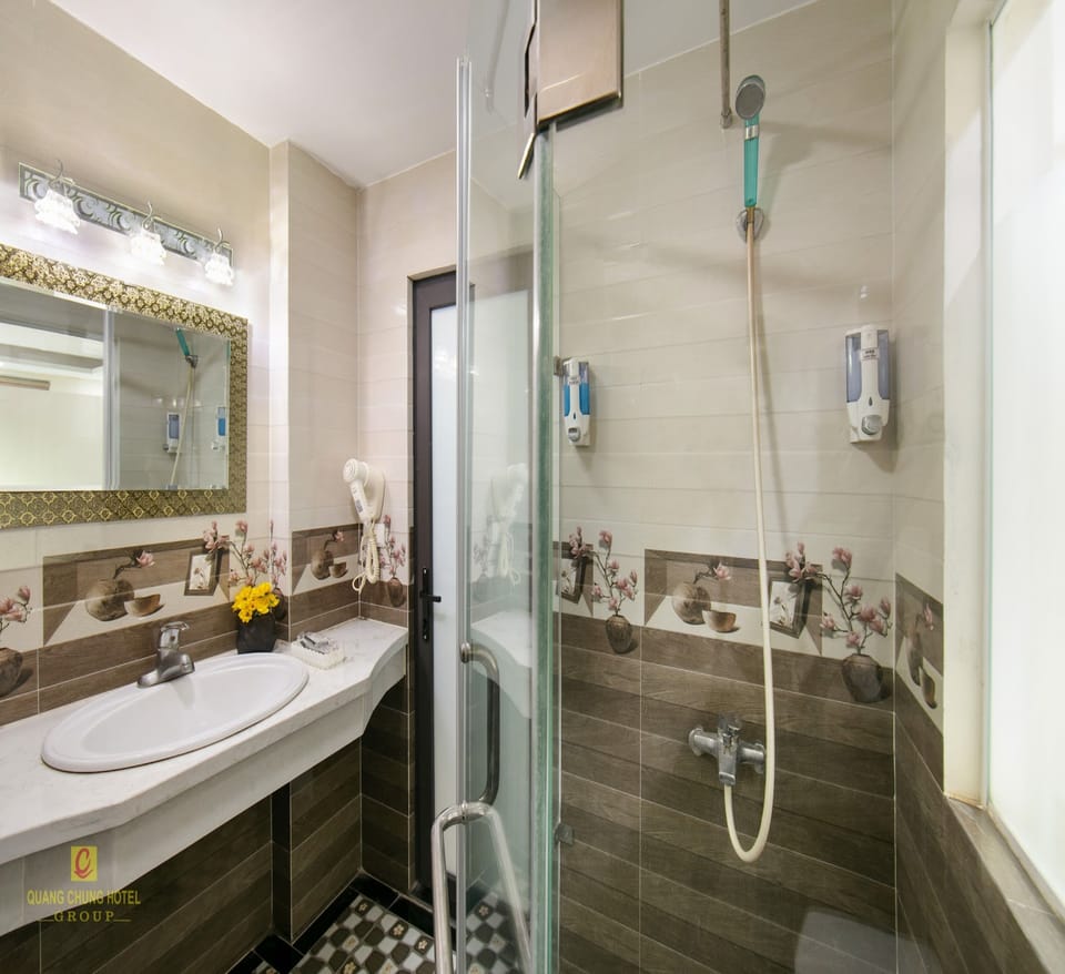 Shower, slippers, towels, soap