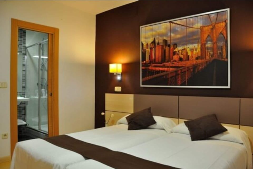 Standard Double Room, Private Bathroom | Blackout drapes, iron/ironing board, free cribs/infant beds, free WiFi