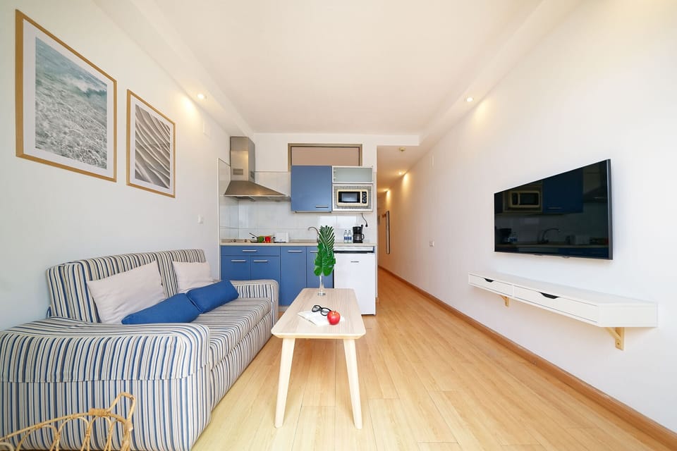 Apartment, 1 Bedroom, Sea View | Living area | Flat-screen TV