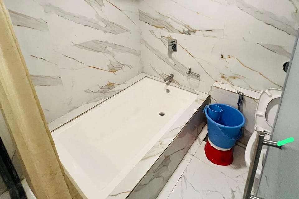 Shower, rainfall showerhead, towels