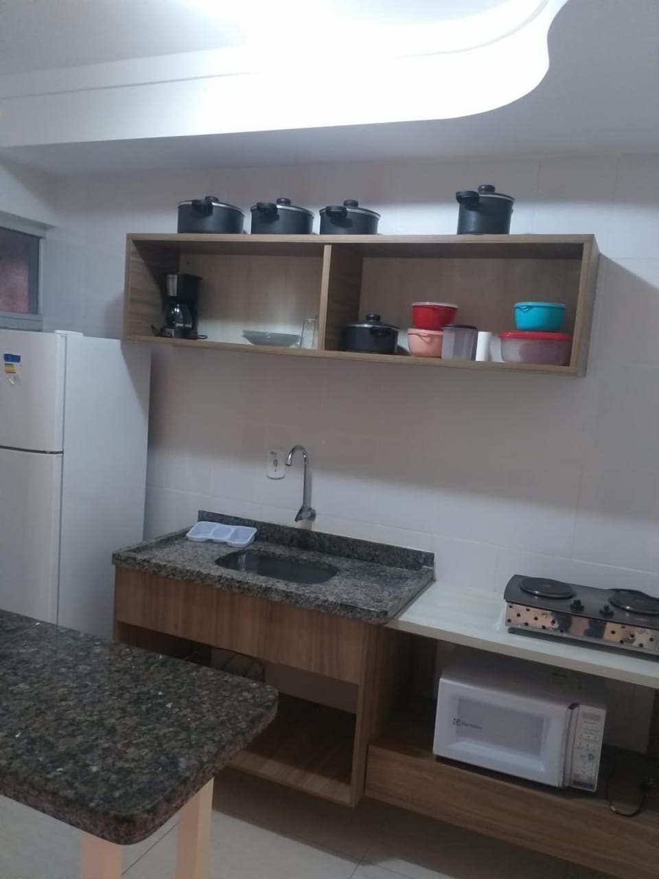 Apartment | Private kitchen | Fridge, microwave, stovetop, cookware/dishes/utensils