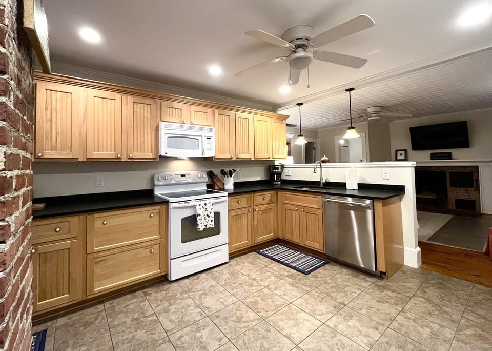 Open kitchen overlooking second living room.