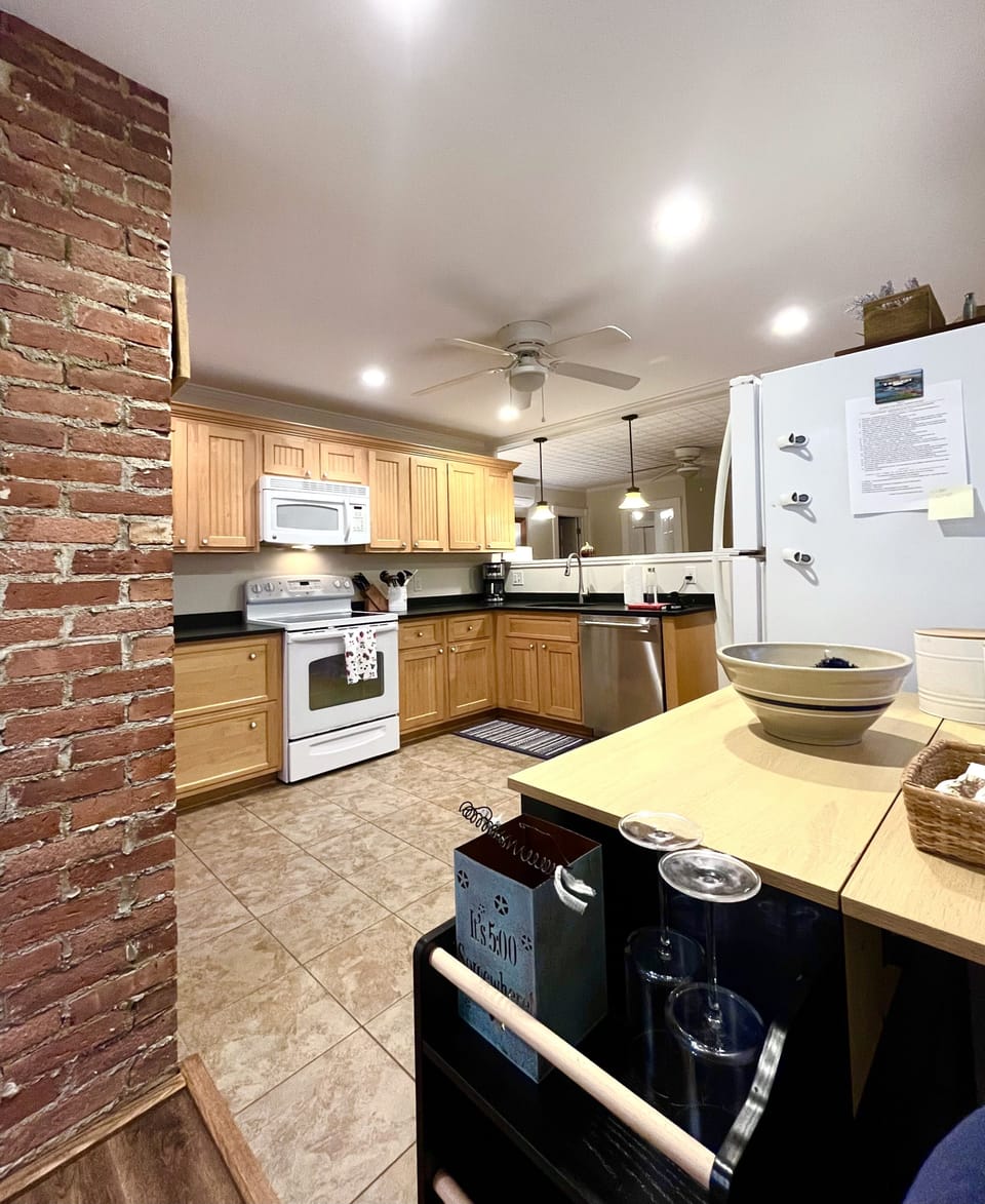 Open kitchen overlooking second living room.