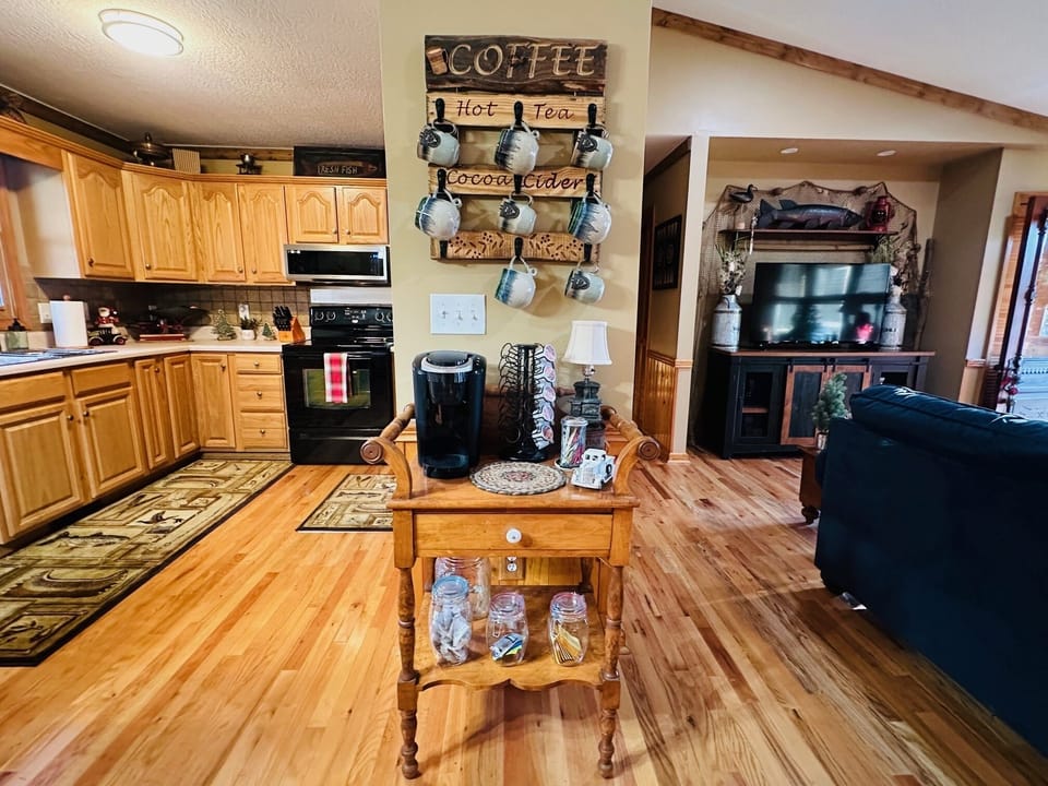 View of kitchen, coffee station & TV nook