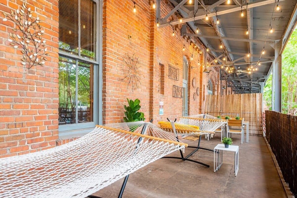 Private Balcony with 2 hammocks, table, & string lights