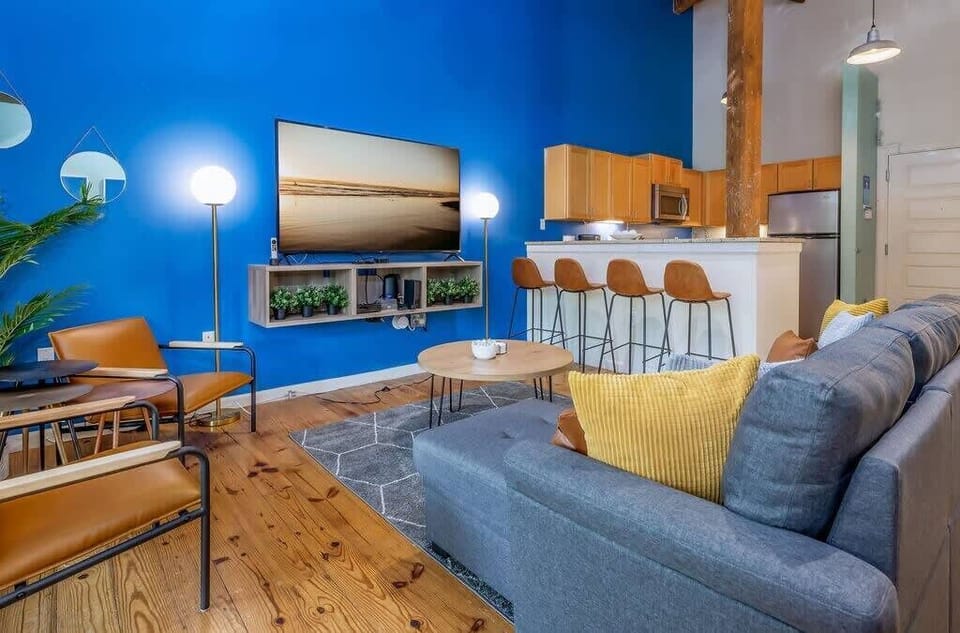 Living Room: ample seating along with 4 barstools