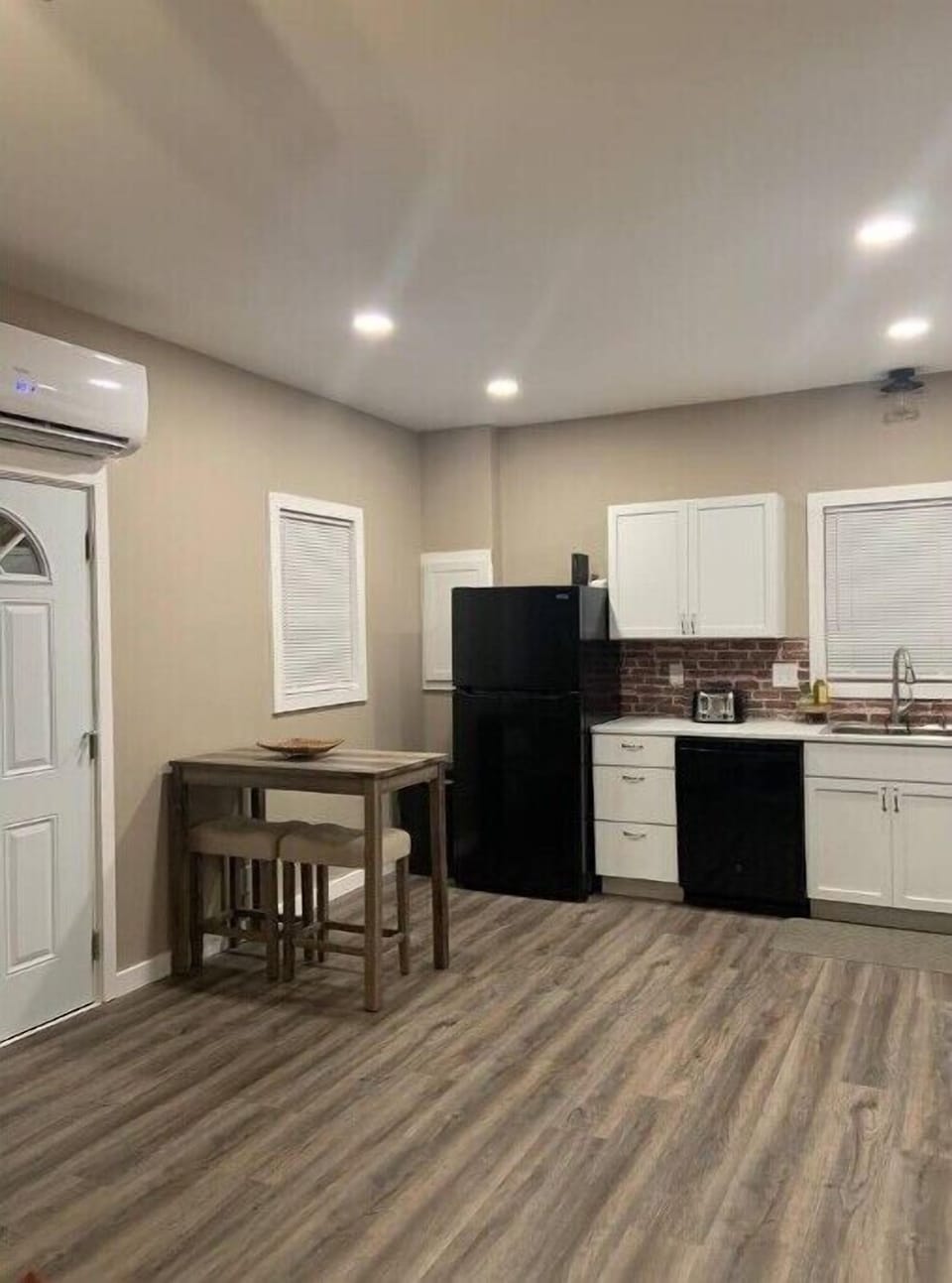 Cozy kitchen with brand new appliances.