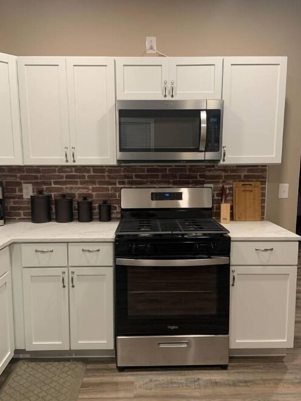 Gas stove and microwave.