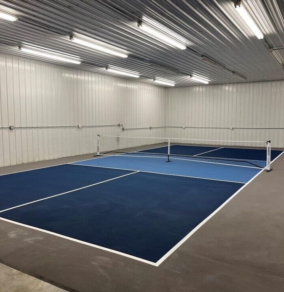 Indoor pickleball court in the ultimate game room