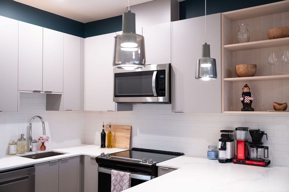 The kitchen featuring Norm, the Revelstoke Mountain Resort powder gnome!