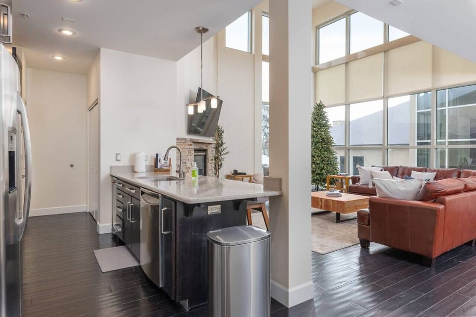 The modern kitchen features stainless steel appliances, combining style and functionality for effortless meal preparation.