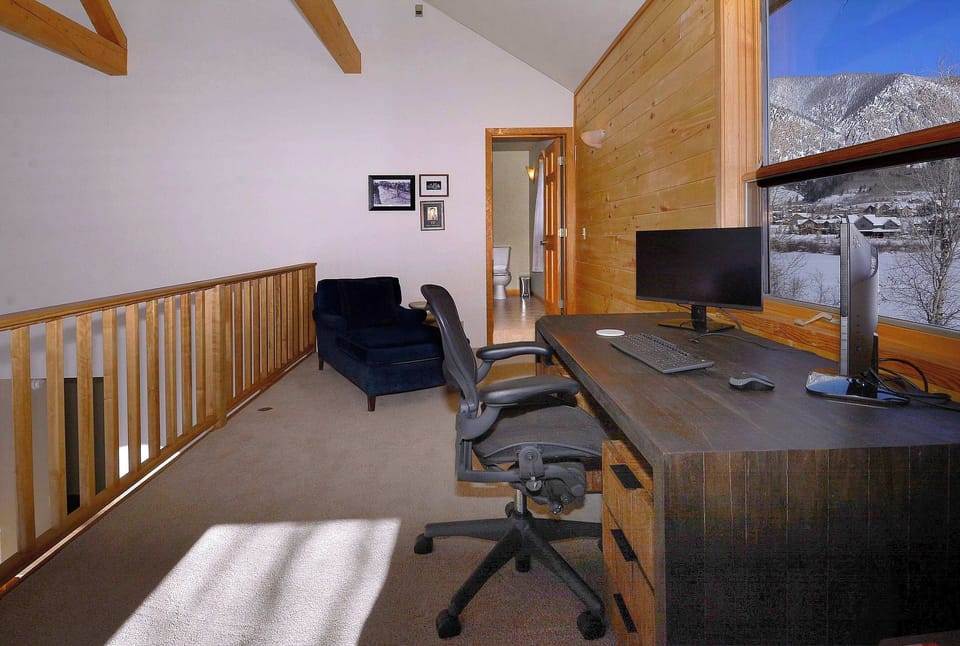 Dedicated work space off primary suite