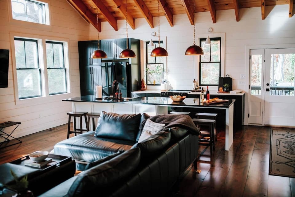 Windows surround the space, bringing the outside in. 