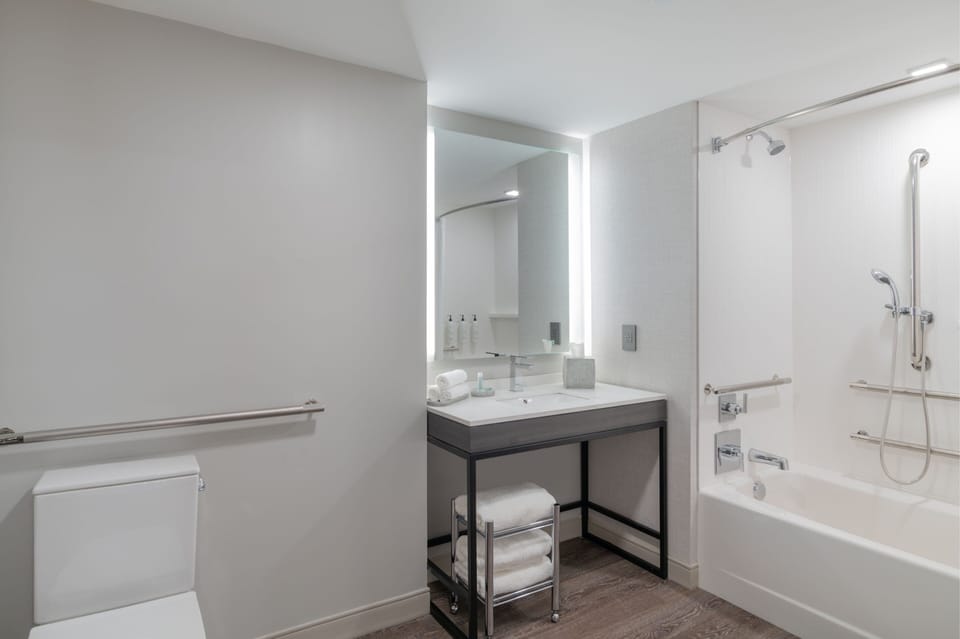Designer toiletries, hair dryer, towels, soap