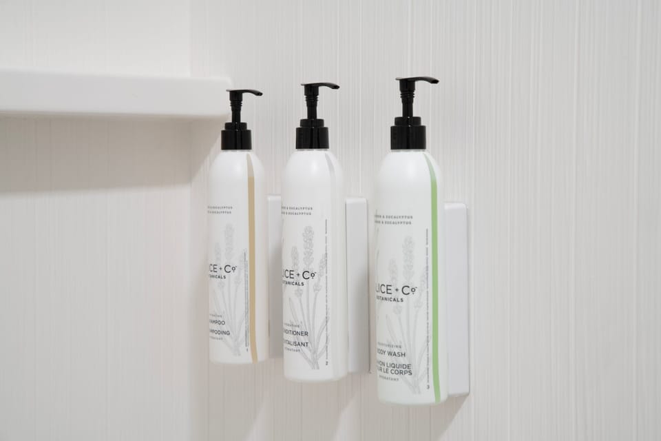 Designer toiletries, hair dryer, towels, soap