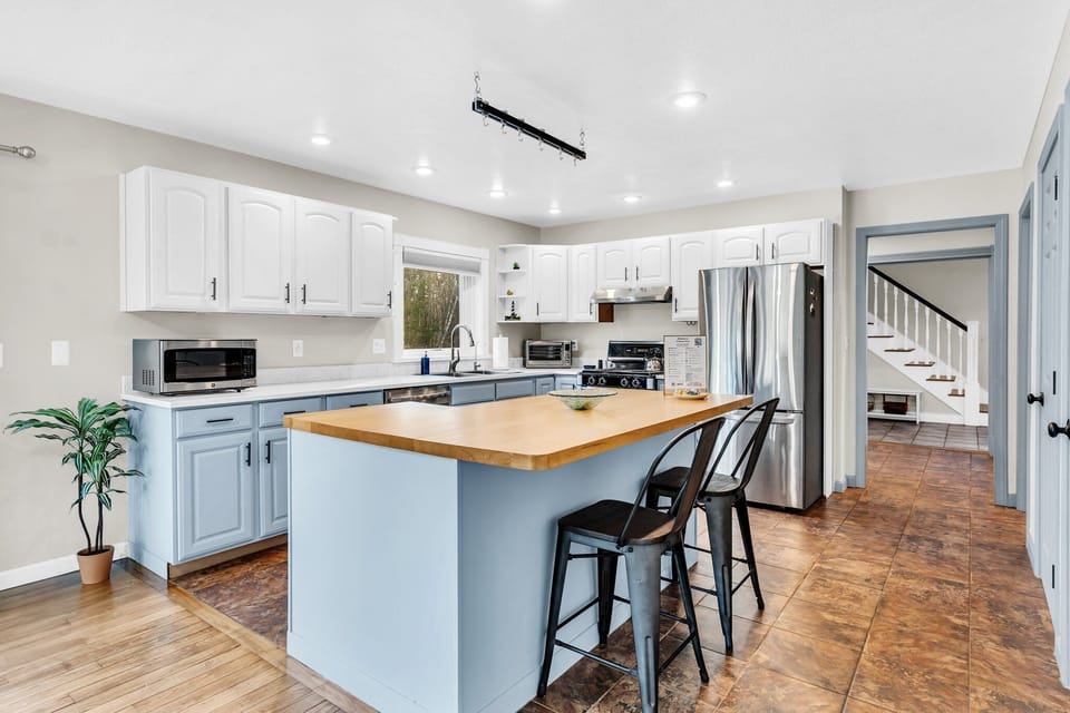 Our spacious kitchen is fully equipped with all cooking and dining essentials.