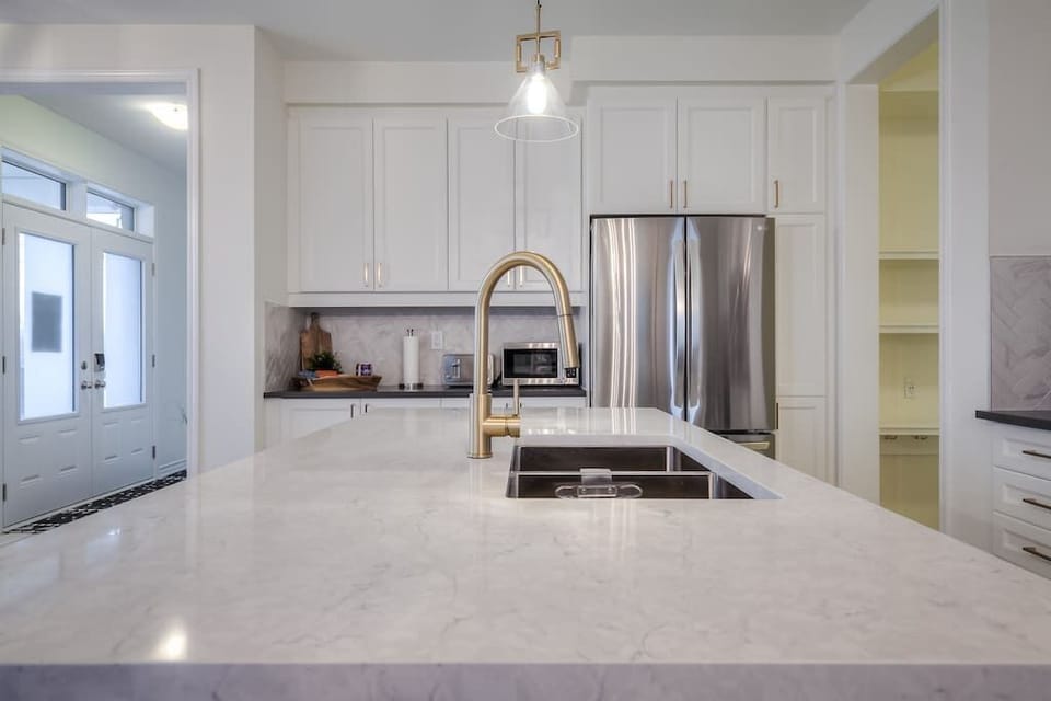 Waterfall Quartz Countertop and open concept