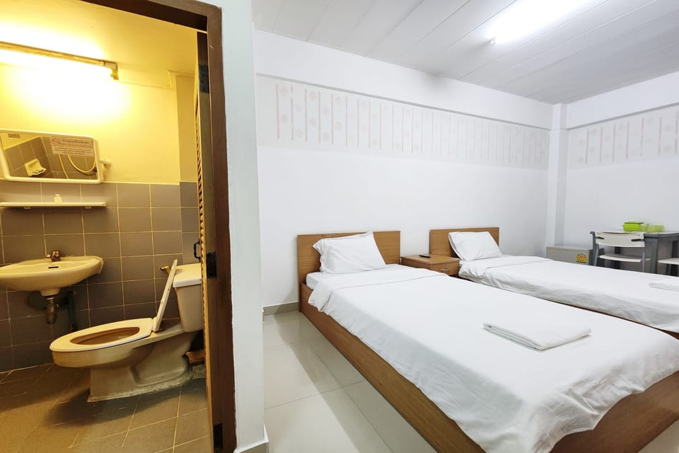 Twin Room | Bathroom | Shower, free toiletries, towels, soap