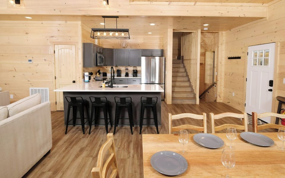 Fully Equipped Kitchen with Dining Table and Bar Stool