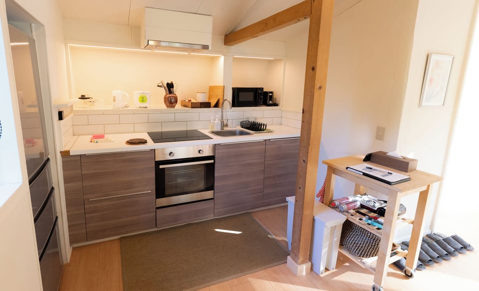Basic Cabin, 2 Bedrooms | Private kitchen | Full-size fridge, microwave, stovetop, coffee/tea maker