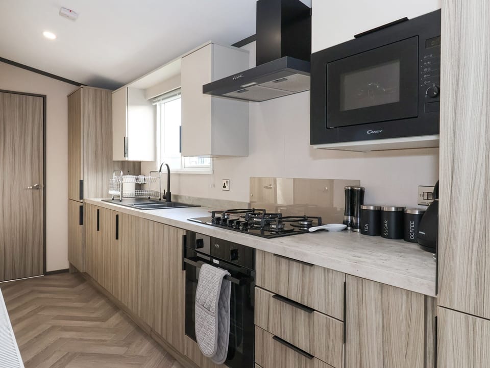 Fridge, electric kettle, toaster, cookware/dishes/utensils