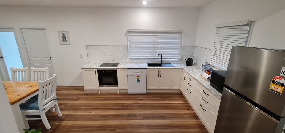 Kitchen, Fridge, Coffee Maker, Microwave, Cutlery, plates, glasses, mugs, Oven