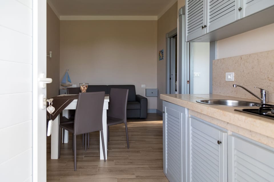 Panoramic Apartment, Sea View | Living area | TV