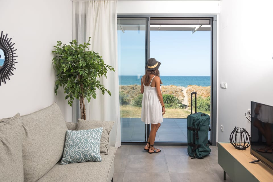 Superior Apartment, 2 Bedrooms, Sea View, Oceanfront | Living area | 32-inch Smart TV with digital channels