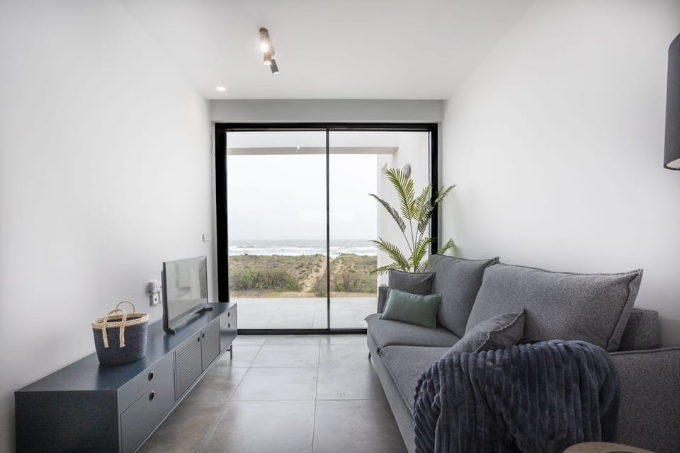 Superior Apartment, 2 Bedrooms, Sea View, Oceanfront | Living area | 32-inch Smart TV with digital channels