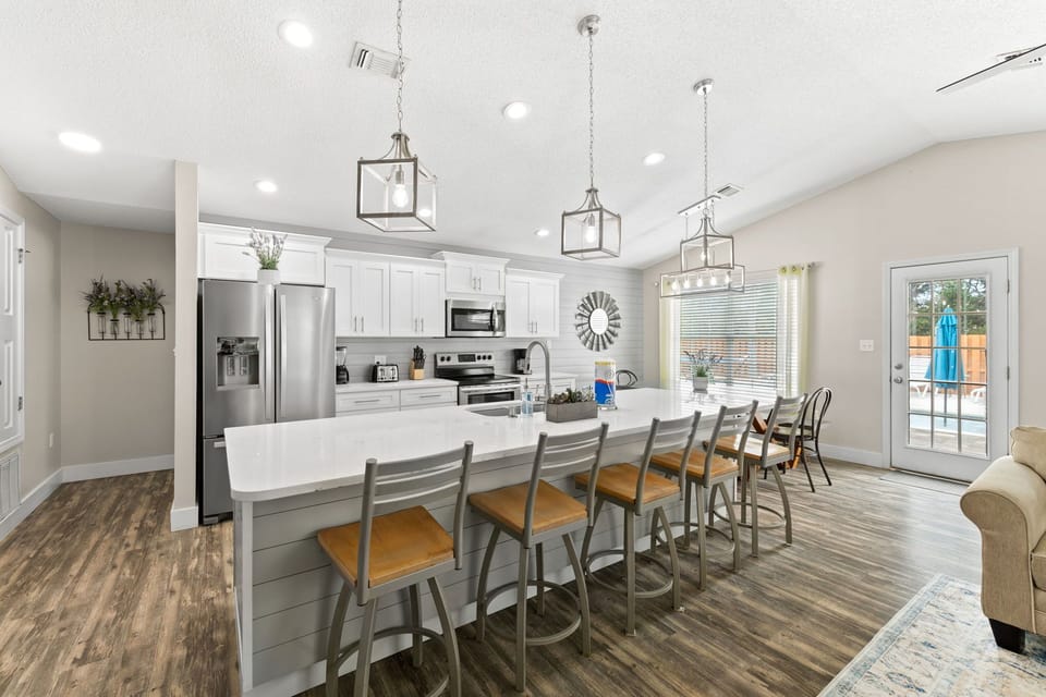 Expansive kitchen island with additional seating.