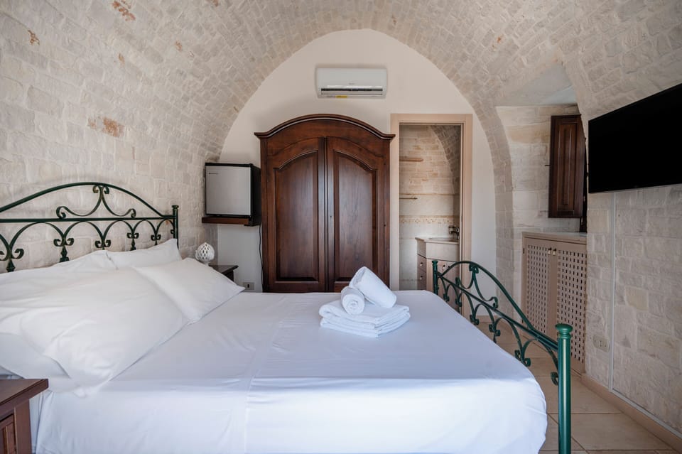 Traditional Duplex | Premium bedding, down comforters, desk, soundproofing