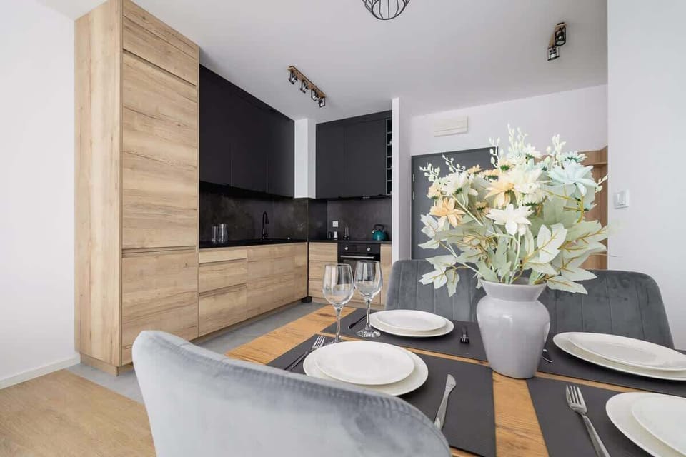 Relax in the stylish living room with a comfortable sofa and modern decor.