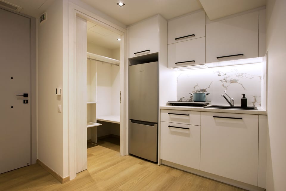 Convenient walk in closet next to the kitchenette for all use.