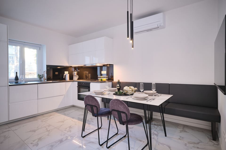 Apartment | Living area | 50-inch LED TV with cable channels, heated floors