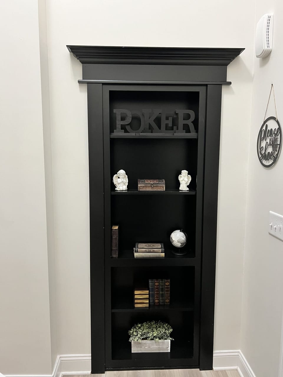 Hidden Murphy door to your private poker room. What a cool and fun set up.