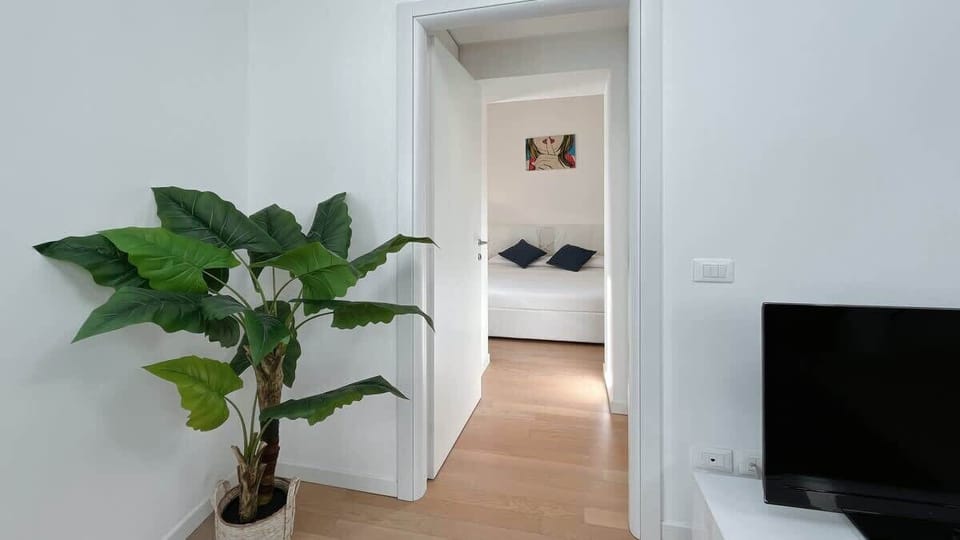 from the living room, you can access to the bedroom in a narrow but elegant hallway