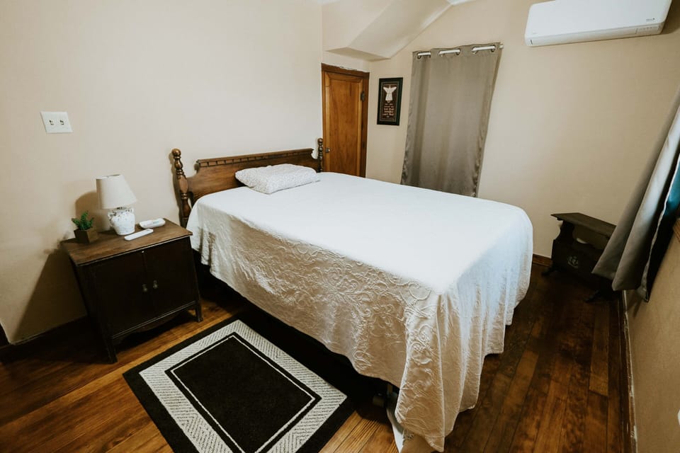 Main floor bedroom with queen bed.