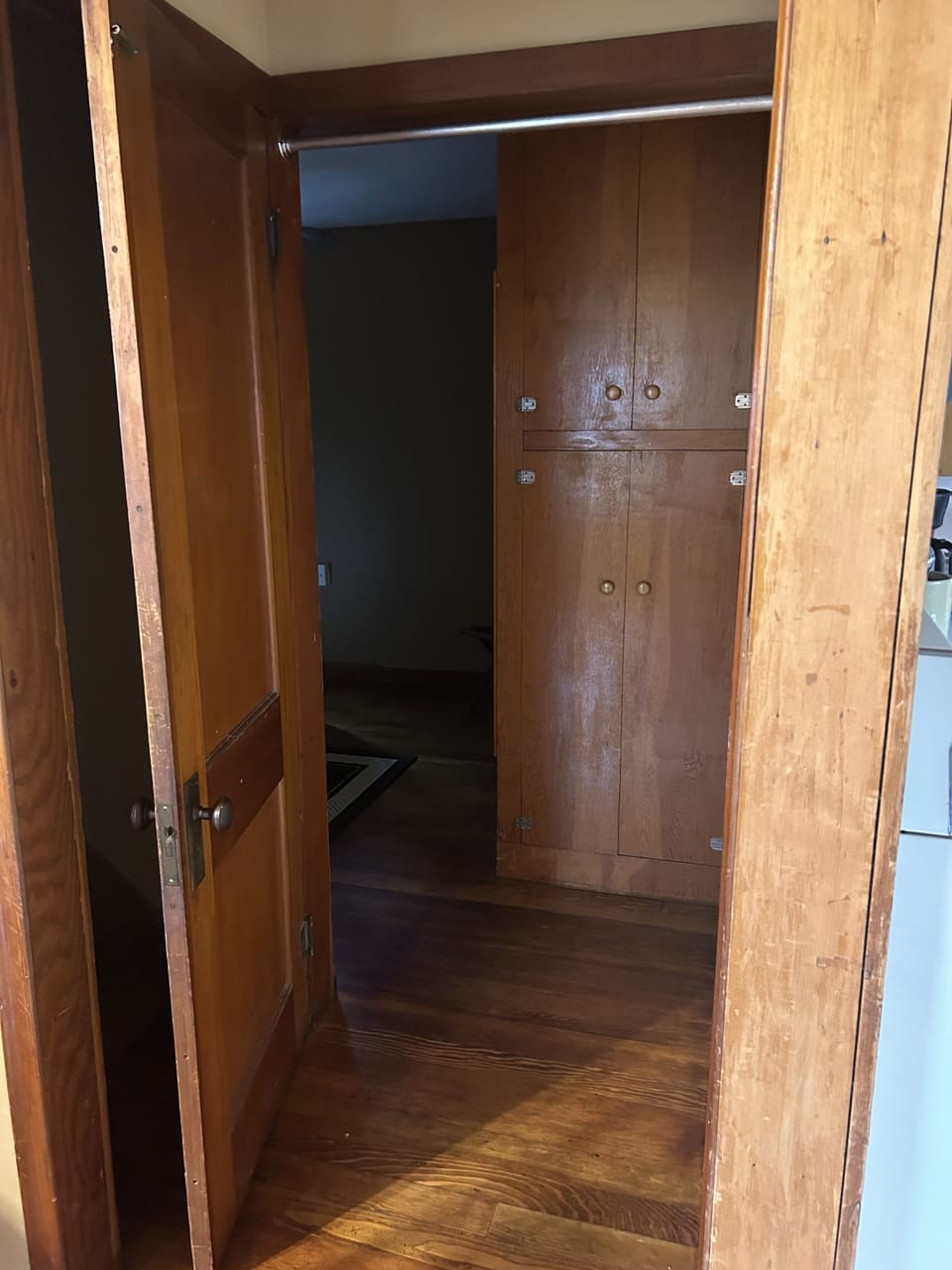 Closet by main floor bedroom supplied with towels, toiletries, and a fan and heater.