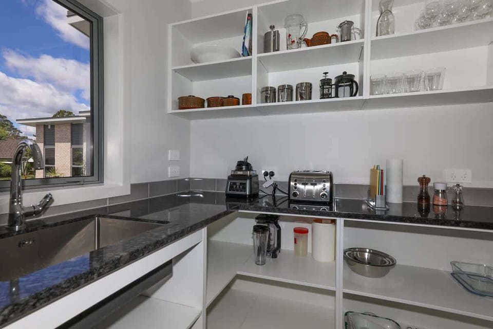 Kitchen bench and open shelving