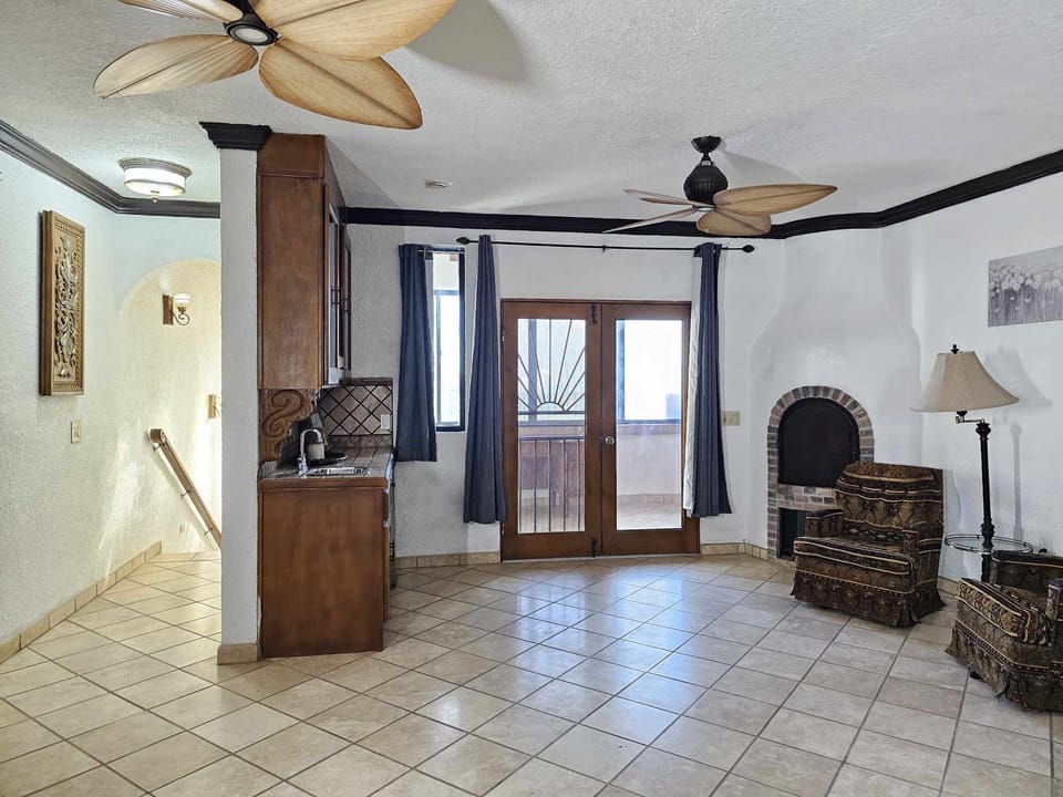 upstairs master bedroom with private bathroom, duel shower heads, kitchenet